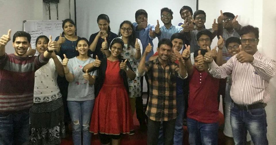 Best public speaking training course for students in Visakhapatnam, Hyderabad, India. Students smile with Revanth Kanakam